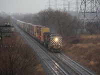 Train 106 is approaching the Waverly road overpass  Bowmanville. in a rain, snow mix with strong east winds. The aging BC Rail unit is suffering electrical issues causing the train to move along at 25 mph. As long as 106 is moving its fine according to the dispatcher. Problem being there on the block of another east bound having power problems as well. that train had left Oshawa 45 minutes prior to 106 catching it. 
