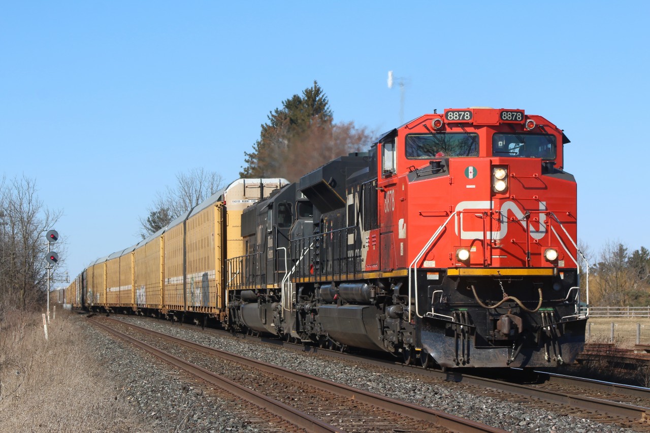It is nice to gain another afternoon westbound on the Halton subdivision. Train 371 now fills the void lately in the afternoon, and is seen here with SD70M-2 #8878 being assisted by IC SD70 #1007 as they re-enter the double track at Stewartown, on a nice clear but cold March day.