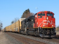 It is nice to gain another afternoon westbound on the Halton subdivision. Train 371 now fills the void lately in the afternoon, and is seen here with SD70M-2 #8878 being assisted by IC SD70 #1007 as they re-enter the double track at Stewartown, on a nice clear but cold March day.