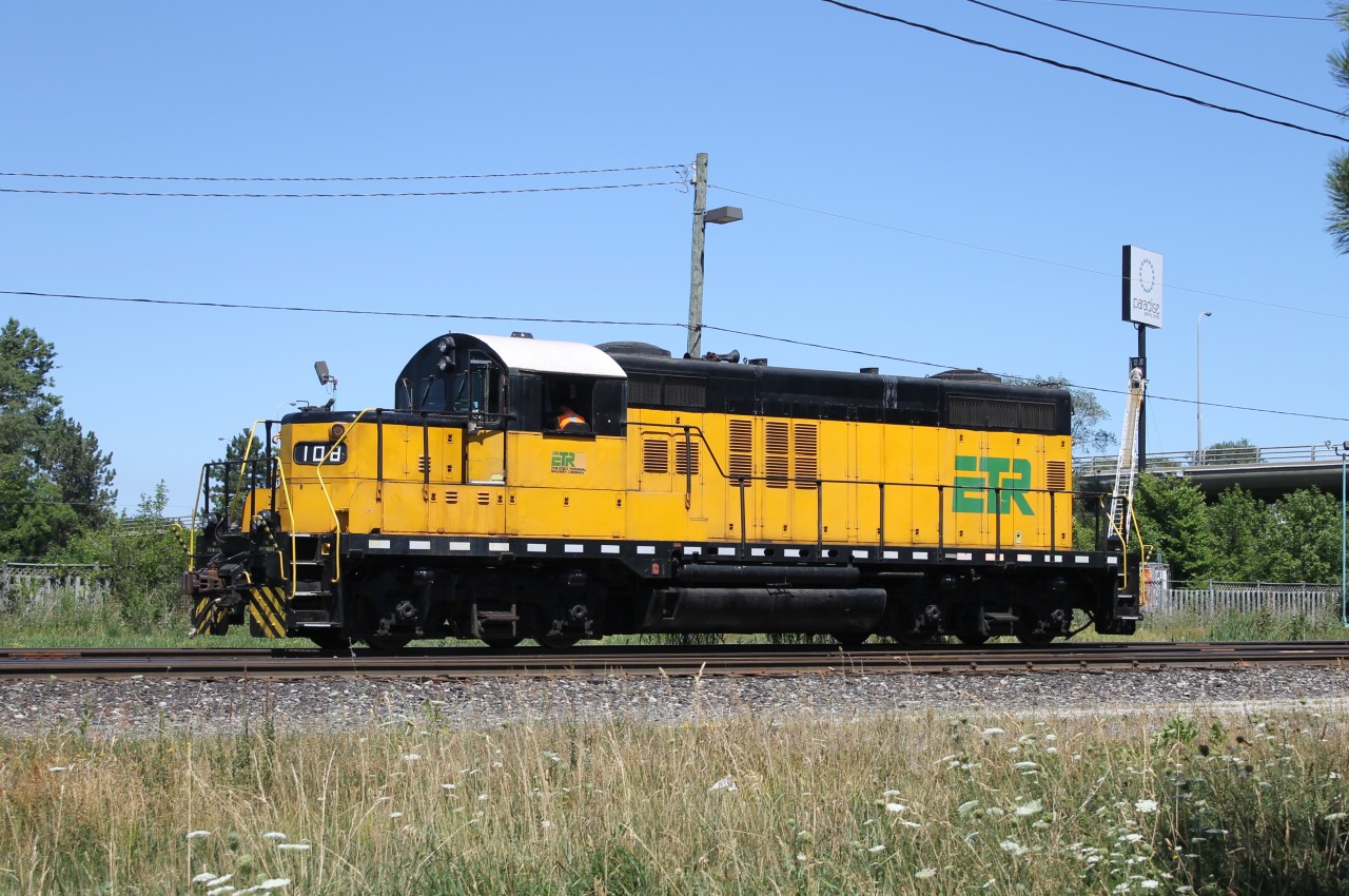 ETR 108 backs up passed Dougall Ave. in Windsor, Ontario.