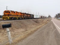 Todays GEXR train 431 apparently had more tonnage then the three usual SD's could handle, so it appears that extra power was added in the morning at Stratford. While I was hoping to catch the return trip of former GEXR GP38 #3821, now repainted and renumbered, this would be a decent replacement. The train is seen just west of Acton finally getting back up to track speed after climbing the Niagara Escarpment just east of town.