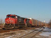Catching westbound freights sunlit on CN in Niagara is a very difficult task, as it is rare the opportunity is ever presented. If there is a train to do it though, it is normally 232, which runs very occasionally. Upon waiting for Via 98/Amtrak 63 "Maple Leaf," my friend's radio indicated a train was going over the Mile 27 detector on the Stamford Sub while the Amtrak approached. A signal indication at Glenridge and further radio chatter showed there was indeed a westbound freight coming.
<br><br>
About 15 minutes after the Amtrak was CN 232 with CN 2541 and 2135. The throw off here was all the autoracks were loaded, which is something I have not noticed on previous 232's I've seen. Under 50 autoracks were in tow however, which is quite normal for this train. I'm not sure of the story behind 2541's conductor side numberboard, but the saying here goes, "it doesn't matter if it's duct tape, fixed is fixed."
<br><br>
The presence of westbound evening freights on the Grimsby Sub has been a consistently rare thing since the 2008 recession effectively reduced the number of trains in half. At the time, 331 and 338 were occasionally later than normal and would appear in the evening, and 332 was often an evening freight. 232 is practically 332's replacement, but barely runs in comparison to 332 during the pre-recession days. Nonetheless, it was quite the treat to get a decently sunlit shot of a westbound for once on the Grimsby Sub. If my memory is correct, this would be the first time I was able to get a photo of such a thing, despite having seen it probably a dozen times before after the recession came about. Previous opportunities like the washout at Jordan in 2014 never came to fruition, as 331 and 422 never appeared until night fall. This time was entirely by chance, since my main purpose of coming here was for the Amtrak believe it or not. CN had recently trimmed up the ROW here so I had to take advantage of it, and luckily the right day was chosen. Considering I would've just gone home after the Amtrak without my friend's scanner around, I think it's time to finally invest in replacing my broken scanner.