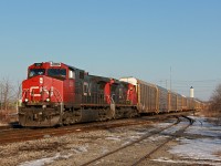 Catching westbound freights sunlit on CN in Niagara is a very difficult task, as it is rare the opportunity is ever presented. If there is a train to do it though, it is normally 232, which runs very occasionally. Upon waiting for Via 98/Amtrak 63 "Maple Leaf," my friend's radio indicated a train was going over the Mile 27 detector on the Stamford Sub while the Amtrak approached. A signal indication at Glenridge and further radio chatter showed there was indeed a westbound freight coming.
<br><br>
About 15 minutes after the Amtrak was CN 232 with CN 2541 and 2135. The throw off here was all the autoracks were loaded, which is something I have not noticed on previous 232's I've seen. Under 50 autoracks were in tow however, which is quite normal for this train. I'm not sure of the story behind 2541's conductor side numberboard, but the saying here goes, "it doesn't matter if it's duct tape, fixed is fixed."
<br><br>
The presence of westbound evening freights on the Grimsby Sub has been a consistently rare thing since the 2008 recession effectively reduced the number of trains in half. At the time, 331 and 338 were occasionally later than normal and would appear in the evening, and 332 was often an evening freight. 232 is practically 332's replacement, but barely runs in comparison to 332 during the pre-recession days. Nonetheless, it was quite the treat to get a decently sunlit shot of a westbound for once on the Grimsby Sub. If my memory is correct, this would be the first time I was able to get a photo of such a thing, despite having seen it probably a dozen times before after the recession came about. Previous opportunities like the washout at Jordan in 2014 never came to fruition, as 331 and 422 never appeared until night fall. This time was entirely by chance, since my main purpose of coming here was for the Amtrak believe it or not. CN had recently trimmed up the ROW here so I had to take advantage of it, and luckily the right day was chosen. Considering I would've just gone home after the Amtrak without my friend's scanner around, I think it's time to finally invest in replacing my broken scanner.