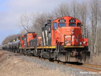 CN 4115 GP9RM leads a beltpack consist south on the St.Clair River Industrial Spur from Sarnia to Courtright in remote mode, captured here at Lasalle line. Having used this consist earlier in the week on an assignment I can say the 4100's are in much better shape than their yard unit counterparts.