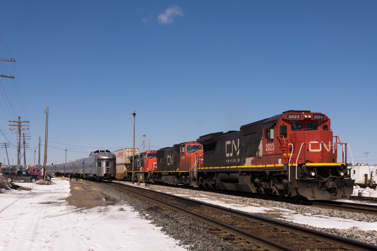Getting underway during The Canadian's long station stop, this assortment of CN motive power is about to traverse the Ruel Sub enroute to Capreol and points south with train X114 in tow.