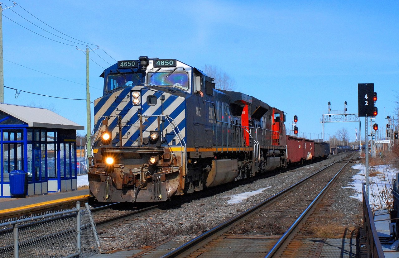 BCRAIL 4650  C-44-9W leading loco with cn-8936  coming out of north service track passing in front of AMT station going direct to Toronto  route CN-x321