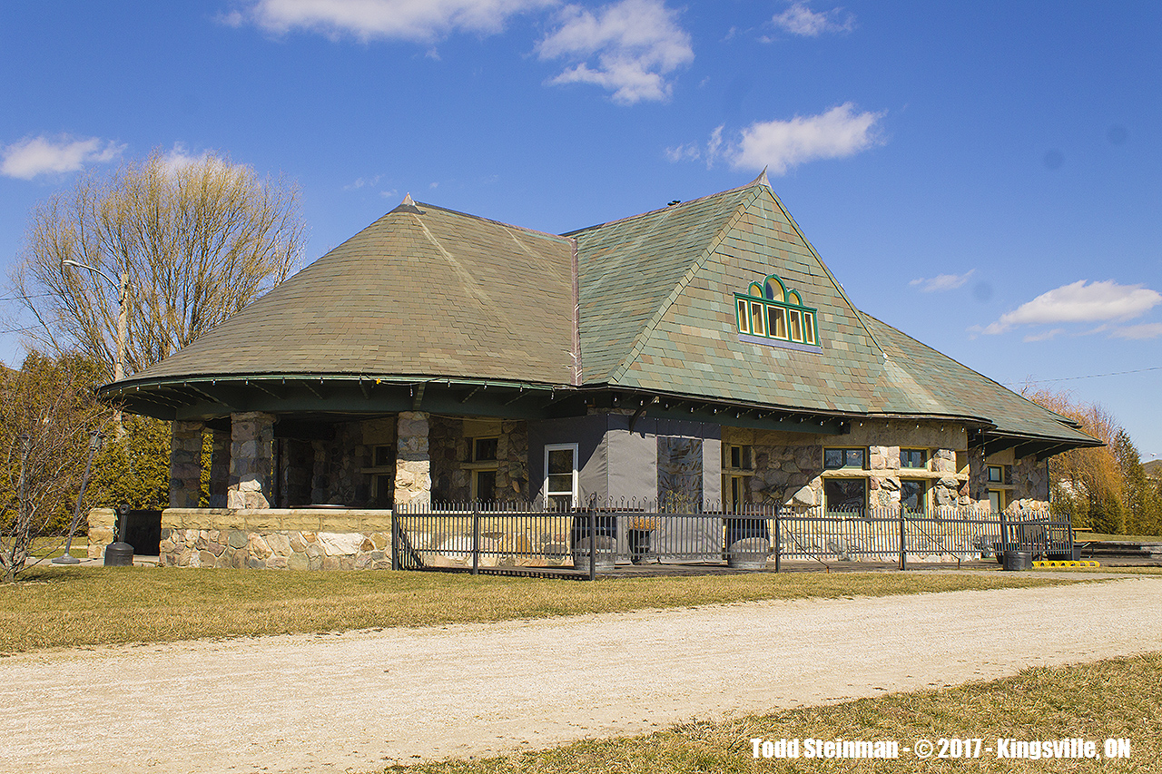 The old Pere Marquette station in Kingsville, one time almost met it's maker by way of the wrecking ball. However, someone, somewhere saw what every rail fan would see - the history, and it was saved despite the removal of a few tiles of slate from it's roof line. 


Now restored both inside and out, as well as the surroundings (used to be all industiral - all have gone and replaced by residential dwellings)...it is definitely an eye catcher along the Chrysler Greenway Trail. The station is now home to Mettawa's, a great little restaurant and well worth the visit. 


PS - any of you veteran photographers out there want to Time Machine this gem? I'd love to see this happen with someone posting the same angle, but with the station still in service.