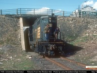 PC 7440 passes under University Ave in Windsor bringing empties back from the Windsor Star. May 1976