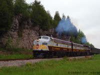 I was a very spoiled Railfan in the early 2000's. Little did I know how good I had it. SD40-2's were on just about every other train, the GEVO invasion wasn't on the radar - EMD's were everywhere. We had annual visits from the Royal Canadian Pacific and/or CPR 2816, heck 2816 was in Toronto just one week later on June 12 2004 and I went for a ride from Aberdeen to Welland. However, the one thing I didn't have much of was photography skill. Most good photos I managed to take in this timeframe was mostly beginners luck. I had yet to find my footings, and while I knew what looked good, I just lacked the experience to find a great photo location and compose it properly. But sometimes, just sometimes I managed something good. This photo is surprising for many reasons, that I chose to shoot RAW - which meant I KNEW it was good - that I composed it without any weeds or other obstructions, and that it is in fact located in Guelph - what you see is the dolostone cap of an ancient seabed - in essence it's the same formation you'd find in the Niagara Escarpment but in an unusual location. With OSR Employee Brad Jolliffe piloting a CPR Crew, a dozen of us are standing on the ground, everyone except for me a patron of the  train that day - for when the train backed up to pick up their passengers, I was the sole photographer left standing, no other local railfans were present, to my amazement. If this happened today... could you imagine the crowd? We were all spolied back then and I think this tells the story to why.