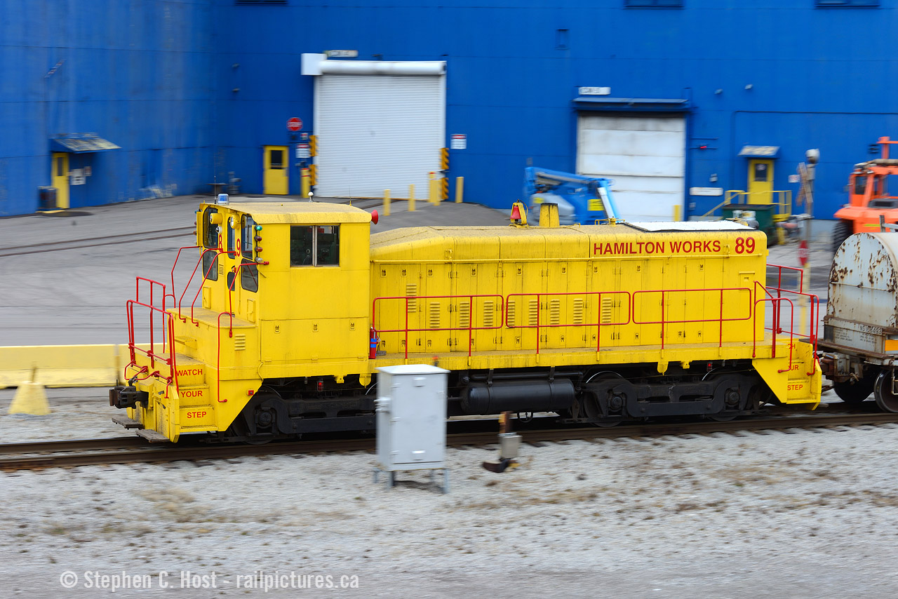 Whoosh! A puff of exhaust and the groan of a baby 8 cylinder EMD 567 signals the Stelco beltpack operator's desire for a bit more speed. This engine has lived it's entire life within this compound, delivered new in 1964  from GMDD London. I decided to try something a little different, shooting at 1/40 to try and get some motion in the shot, 10 frames, only 1 turned out and that's all you need, right? SOR would lift these three coil cars produced by the "Z" Galvanizing line later that evening. It's nice to see activity at Stelco again as it's been a couple years since I've personally seen anything move in there.