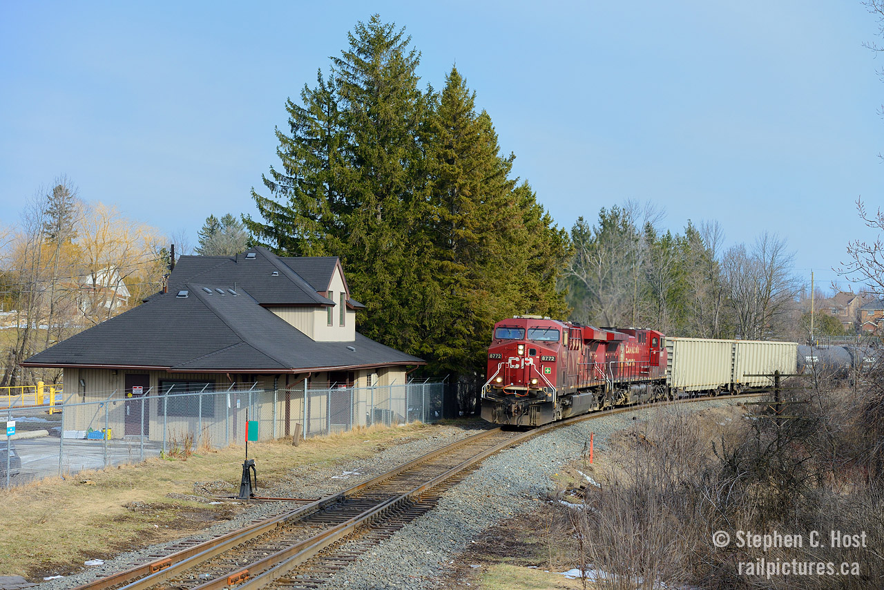 Hidden in plain sight -  here's one for the  Station guys,a photo that took some planning and time to execute. When I Saw Arnold Mooney's photo of  Waterdown North in 1980  I looked on the map and saw a structure close to the tracks.. could it be? Yes... it is! Waterdown North still stands to this day, used as offices for Compass Minerals. You can't see it from the road, it's blocked entirely by trees. And sun angles require a Northbound at the right time of day.For more info on Waterdown North, visit the Old Time Trains entry  http://www.trainweb.org/oldtimetrains/CPR_London/stns/waterdown.htm. This is the only station from the Southern Ontario Pacific extension of the CPR Hamilton to Guelph Jct line remaining of course, and one of Four stations remaining on the Hamilton sub.  (which are Waterdown North (CP), Hamilton Hunter St (TH&b), Smithville (TH&B), Welland (PC/CR/TH&B) - Honourable Mention is Aberdeen which was once part of the TH&B Welland sub.)