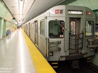 TTC T1 5291 trails a 6-pack of Bombardier T1's heading south on the University Subway line, paused at the very mint green St. Patrick Subway Station, its decor a product of the early 1960's and still sporting its original green circular metal tiling.