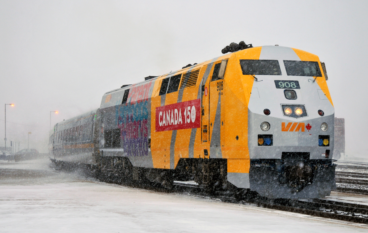 76 departing Brantford on a beautiful March afternoon, with Canada 150 wrapped VIA 908 in the lead