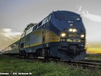 Thee isn't an emergency here....just VIA train 78 led by engine 911 traversing the countryside going through the small farming hamlet of Northwood with it's evening passengers aboard.