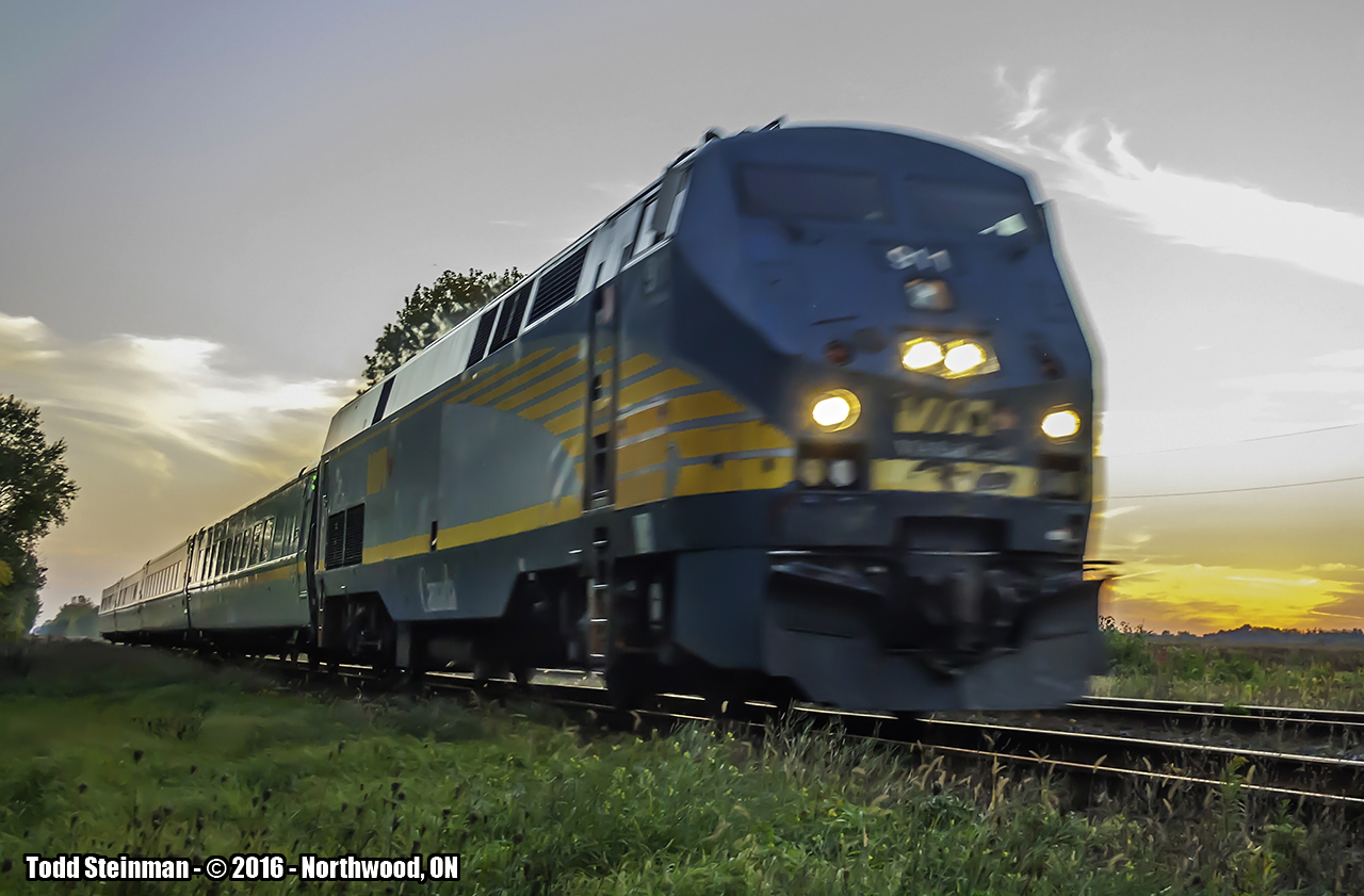 Thee isn't an emergency here....just VIA train 78 led by engine 911 traversing the countryside going through the small farming hamlet of Northwood with it's evening passengers aboard.