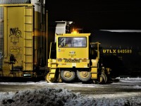 Switching the car repair track is trackmobile 4150 a Magnum model. A fan of the Tom Sellick series "Magnum PI" has added the appropriate initials under the model name.