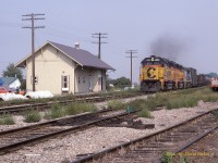  CSXT #321 hustles past the Ex NYC Depot at Comber, Ontario on the CN Caso Sub.
