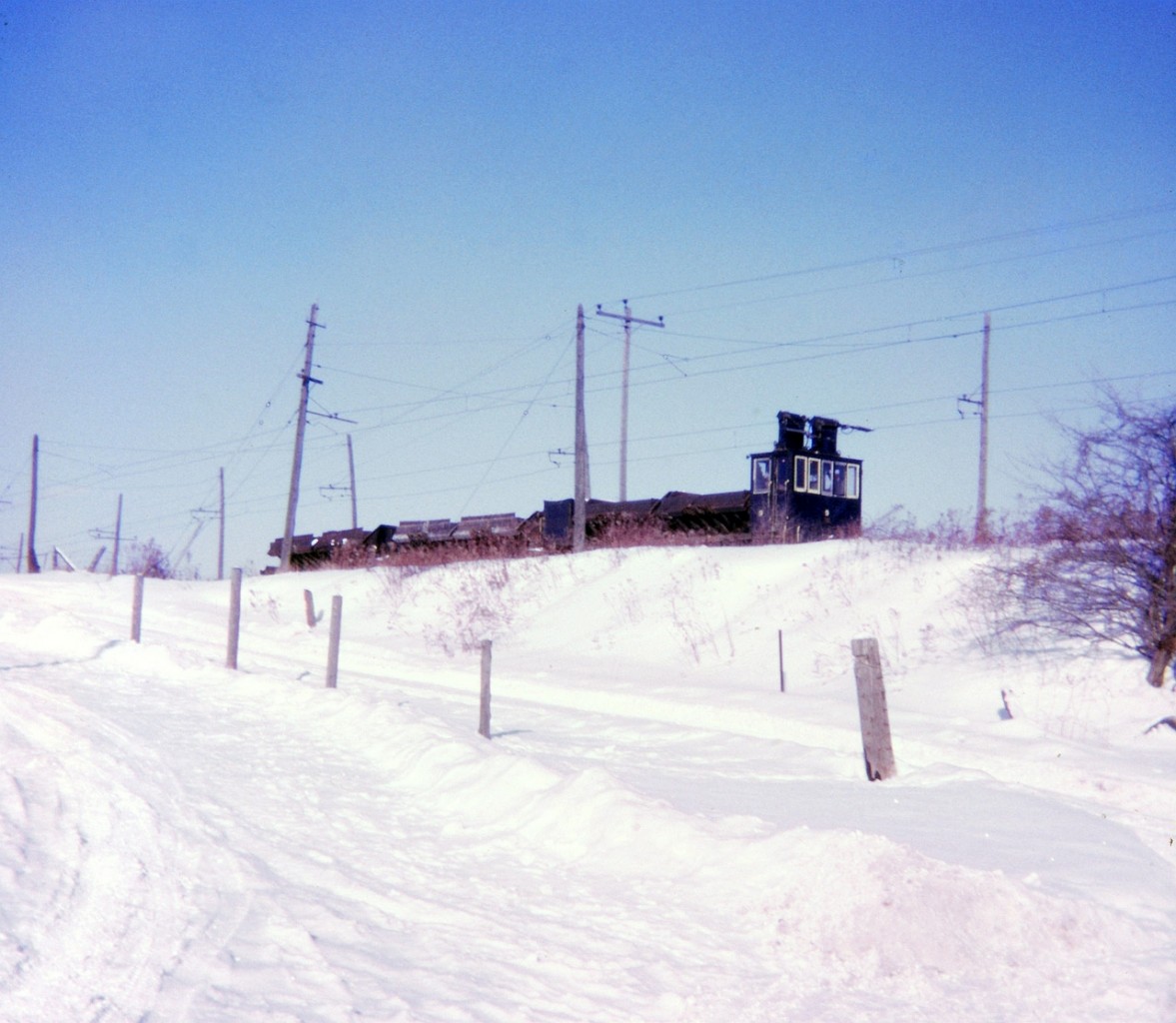 another image of the unique trains on Canada Cut & Crushed Stone. Image taken on Harvest Road east of Greensville Ontario. It was a cold winter afternoon for pictures with my Kodak Instamatic.