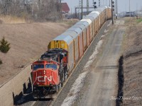 CN 5710 with CN 8820 leading train 371 out of Sarnia to Port Huron, MI., via the the Paul M. Tellier under the St. Clair River.