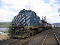 Train 571 ready to depart Quesnel and challenge the 2.2 percent grade of Cotwood Hill with full tonnage to Greening siding. The cars will be stored at Greening and the crew will return to Quesnel lite engine. In the interm, a crew  will taxi from Prince George to Quesnel and using the locomotives will take another cut of cars up to Greening, pick up the cars there and continue to Prince George. The original crew will taxi to Prince George and after their rest will take a train south to Williams Lake.