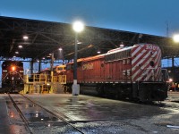 While an AC4400 (9640) gets some quick repairs done so it can head out and pull freight Red Barn 9001 with 9006 in ahead of it get's inspected to be shipped out.