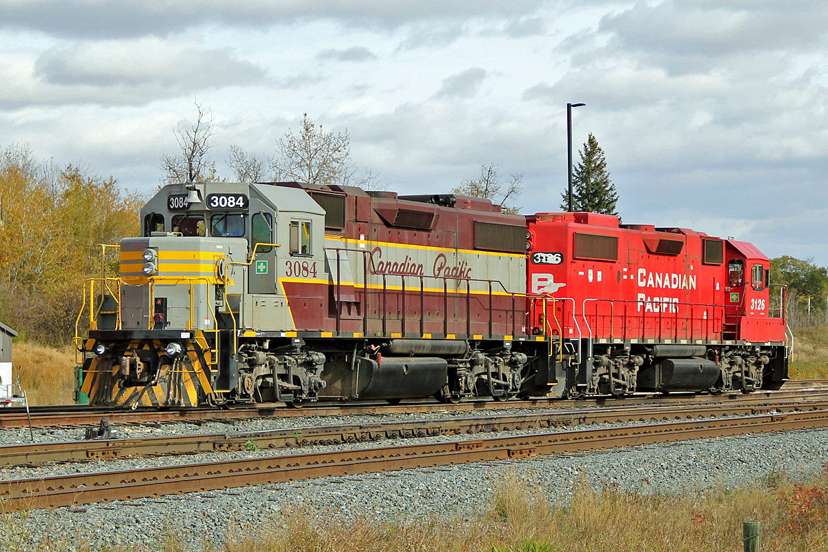 GP38-2 CP 3084 in Tuscan & Grey heritage colours and sister 3126 wait for an assignment at CP's Scotford Yard.