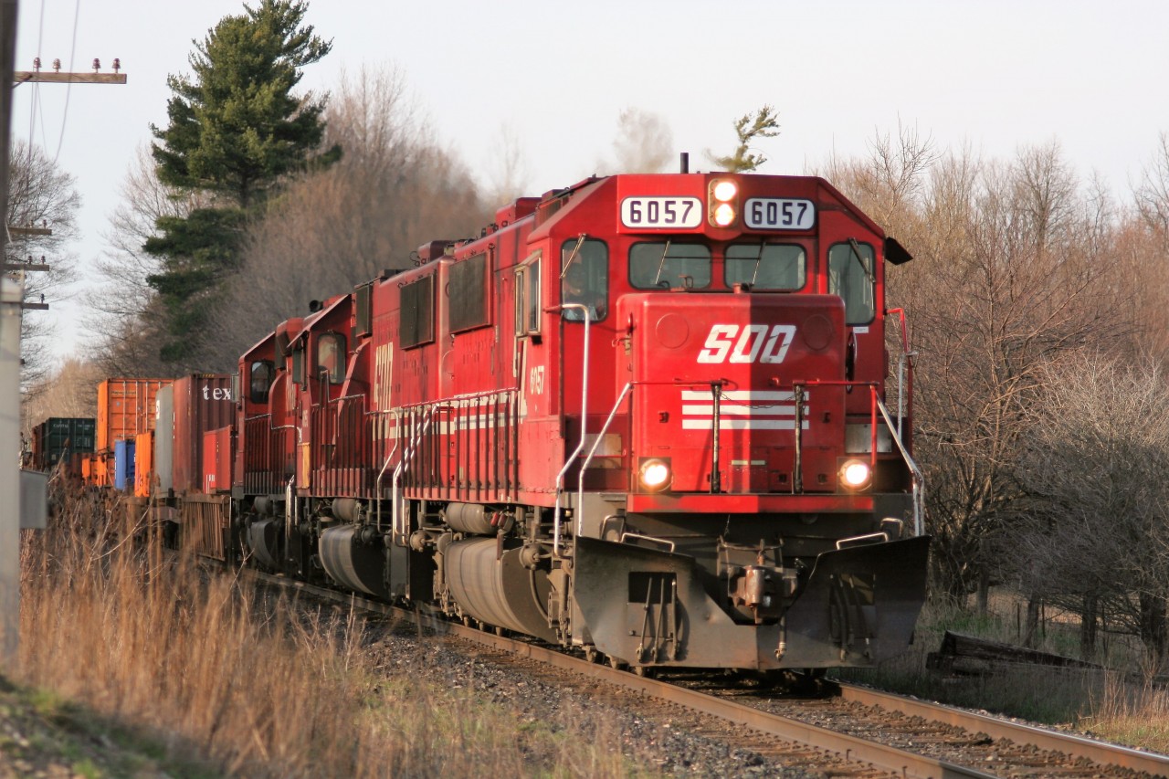 Coming back from Paris, I had heard this westbound CP train closing in on Ayr so I knew I wouldn’t have much time to set-up. Sure enough, just as I reached Reidsville Road, I had about five seconds to grab the camera and click this shot of two SOO SD60’s and a CP SD40-2 as they waste no time heading towards London in the fading light of a gorgeous spring day.