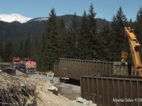 BCR crews, cleaning up, derailed wood chip cars.