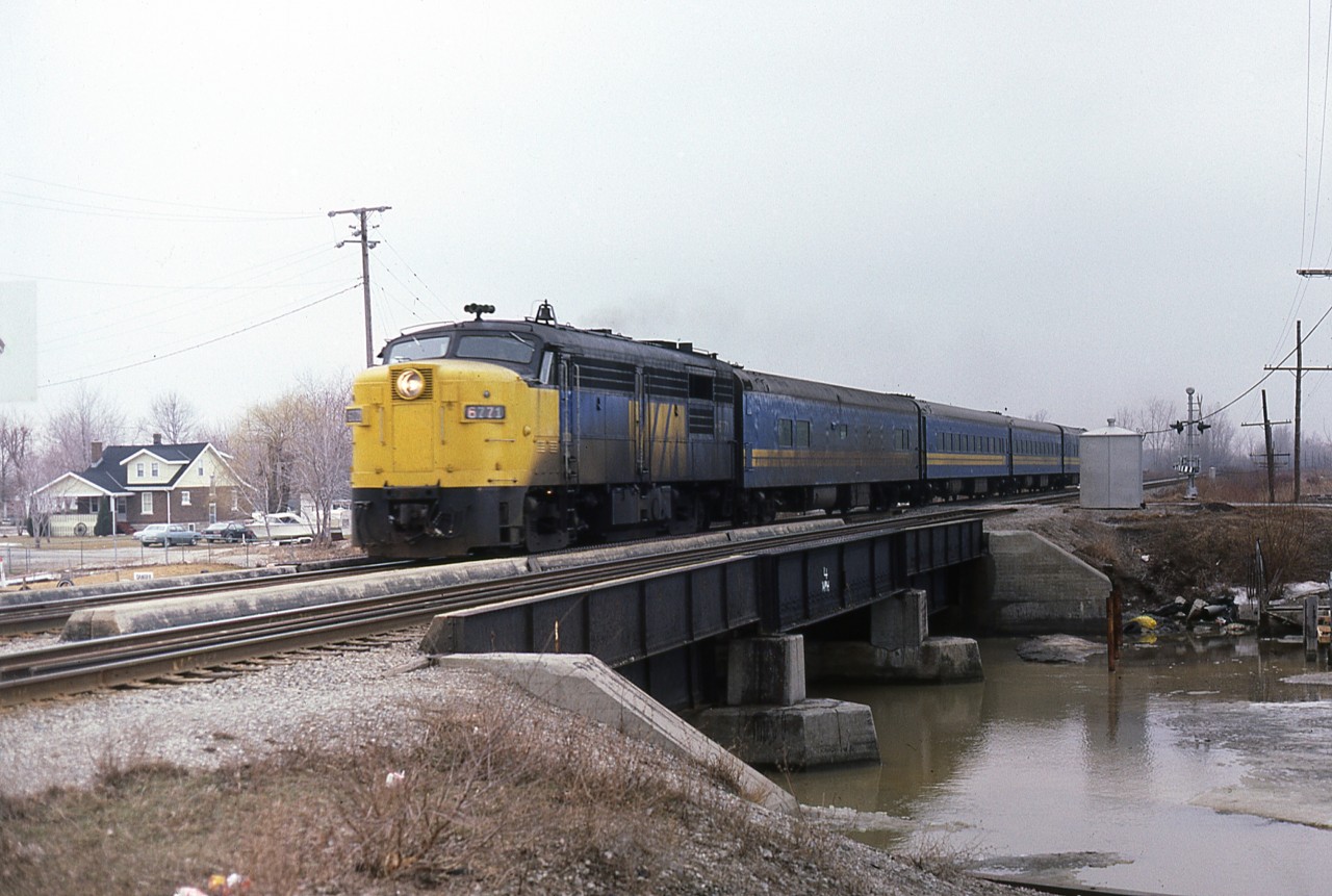 FPA-4 6771 has a 4 car consist on Windsor-Toronto train 74 as it passes through the lakeshore community of Belle River Ont in March 1982. I would often bring the camera when I was working the C&O Walkerville yard job, and try to  pick off any movements on CN or CP between home, in Chatham, and work.