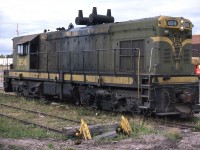 
My wife and I were married on August 30, 1975. We spent the next 15 days driving to northern British Columbia and back. For the most part the camera was pointed at ourselves or the surrounding landscape. But in a few locations, and especially in the small town ( at that time) of Yorkton, Saskatchewan, it was pointed at something just as beautiful. During this timeframe, CN assigned G-8 854 to Yorkton to handle local elevator chores. The GMD product was still wearing factory paint when I found it resting in the small yard. I had to shoot it late in the afternoon because the sun angle the next morning would not be conducive. She's obviously throwing oil at this stage in her life. Retired in July1981 without being repainted, and scrapped at Transcona at some point thereafter.