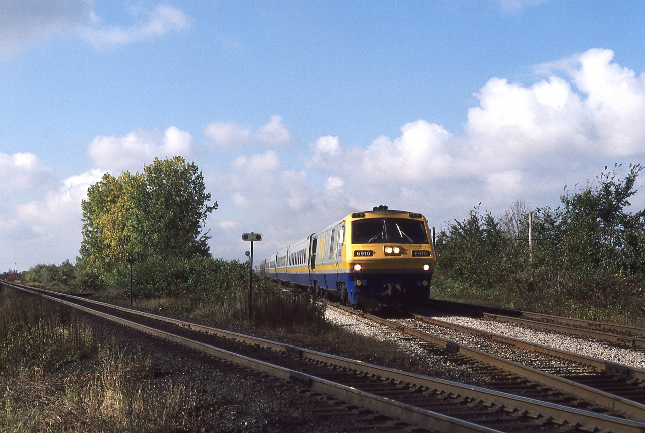 While living in Chatham and wanting to document the twilight of VIA's FP9's and FPA/FPB's, I also wanted to blend in the LRC fleet. But it was difficult to find those units on Windsor trains, and be able to coordinate that with my own available time. But on a nice October day in 1986, the 6910 was presented to me on train 74 as I spent a few hours at my favorite location. The sumacs have turned to their fall colours but other foliage is just on the cusp, as the MLW heads east to it's station stop in the Maple City.