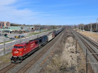 AC440CW CP 8615 looks pretty fresh (especially compared to most of CP's grungy looking AC4400CW fleet) as it leads empty ethanol train CP 651 through Pointe-Claire. Trailing is CEFX 1039.