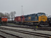 <b> CSX on a CP on CN </b> A CSX ES44AH which came in on a CP potash train takes a rest between trips in CN's Lynn Creek yard.