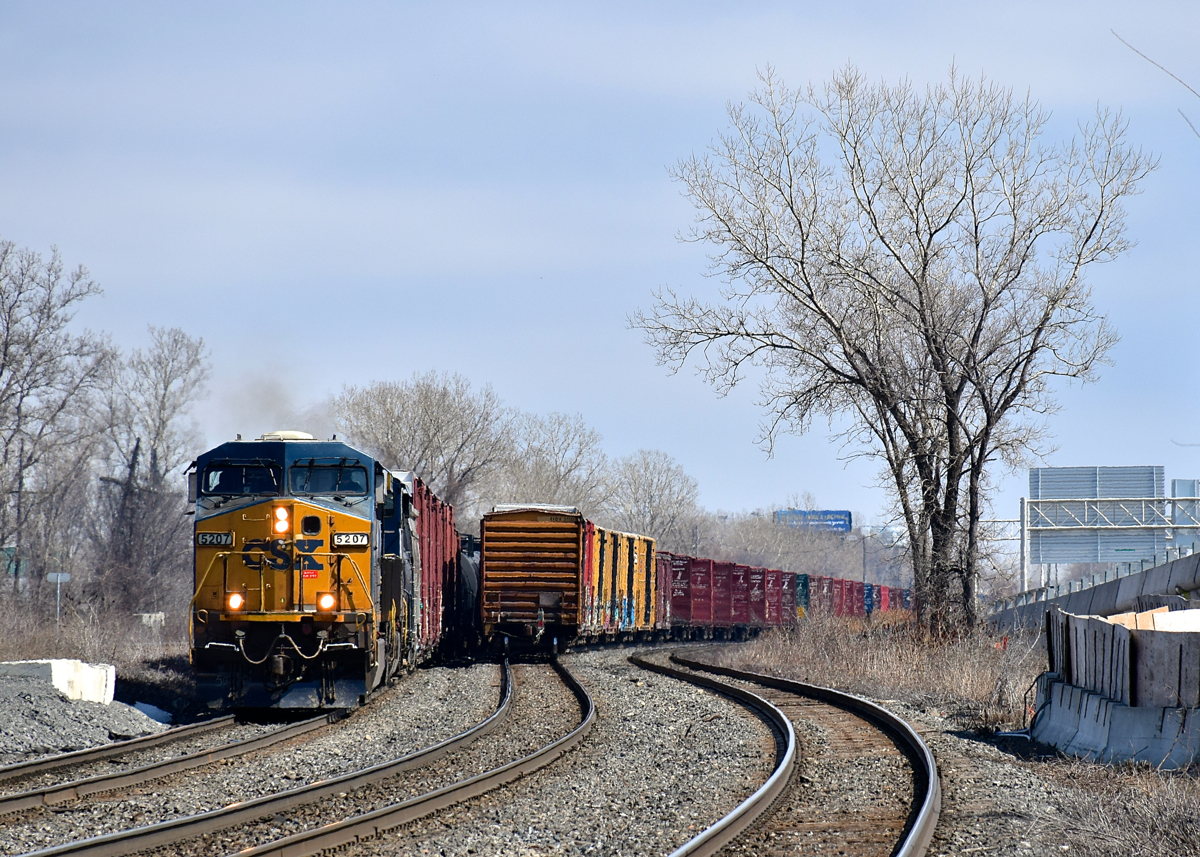 CN 327 with CSXT 5207 & CSXT 416 is slowly starting to pull after waiting for CN 368 to clear the north track; the latter train's tail end is seen at right.