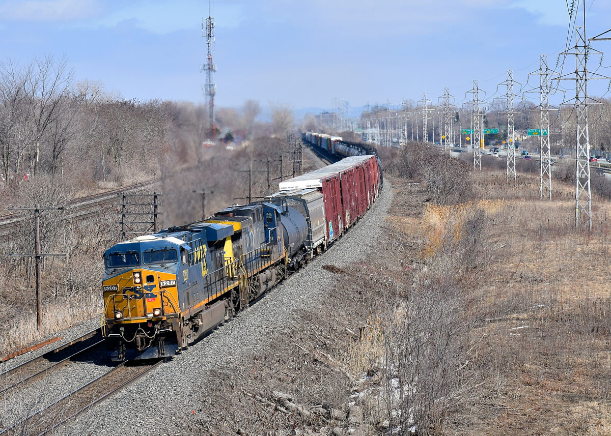 CSXT 5207 & CSXT 416 lead a 78-car CN 327 through Beaconsfield on a gorgeous and warm afternoon.