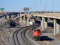CN 372's power (CN 8011 & CN 5679) head west on the Montreal Sub, on their way to track 29 (the only track left from what was Turcot Yard) to pick up CN 2921, which was the DPU on a grain train. At far left can be seen where the tracks of teh Lachine Spur were, just recently torn up where they left the Montreal Sub.