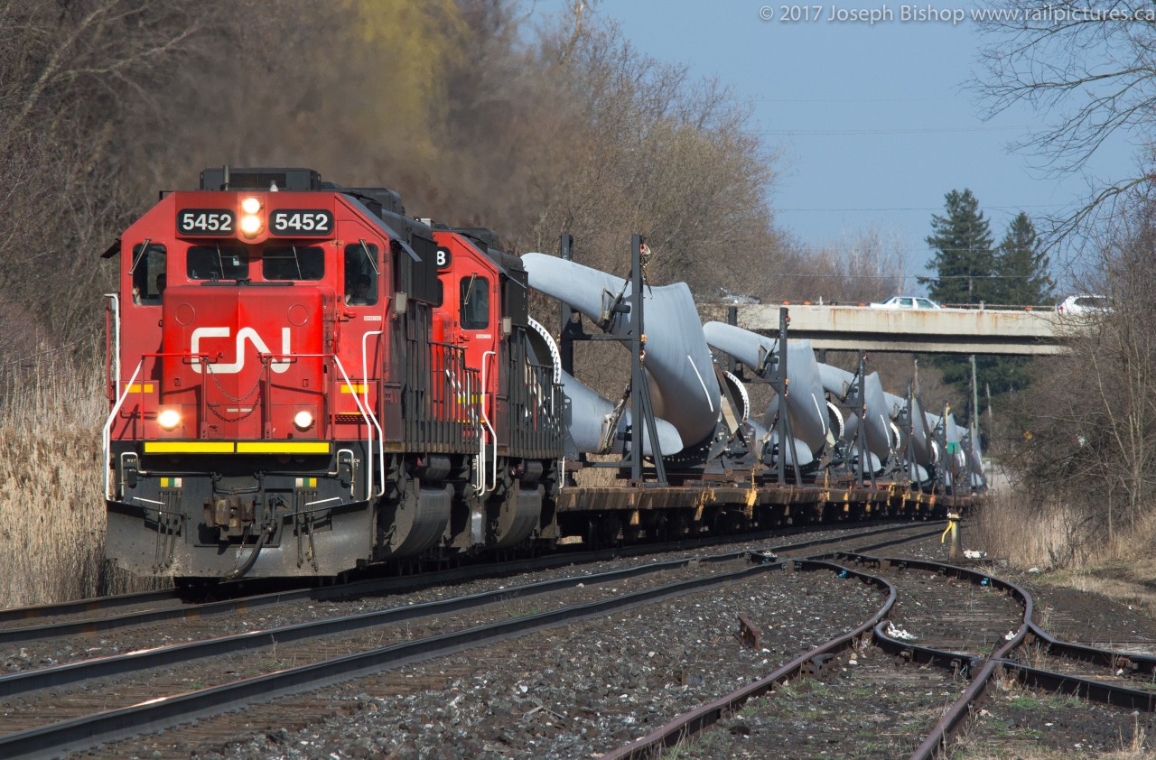 This was probably one of the most shots trains in Ontario today, CN X311 is seen grinding up grade at Copetown with CN 5452, CN 5408 and 74 loaded windmill flats.  Learning that this train was going to make it through this area in daylight made it a no brainer to pop out to Copetown for a couple shots.