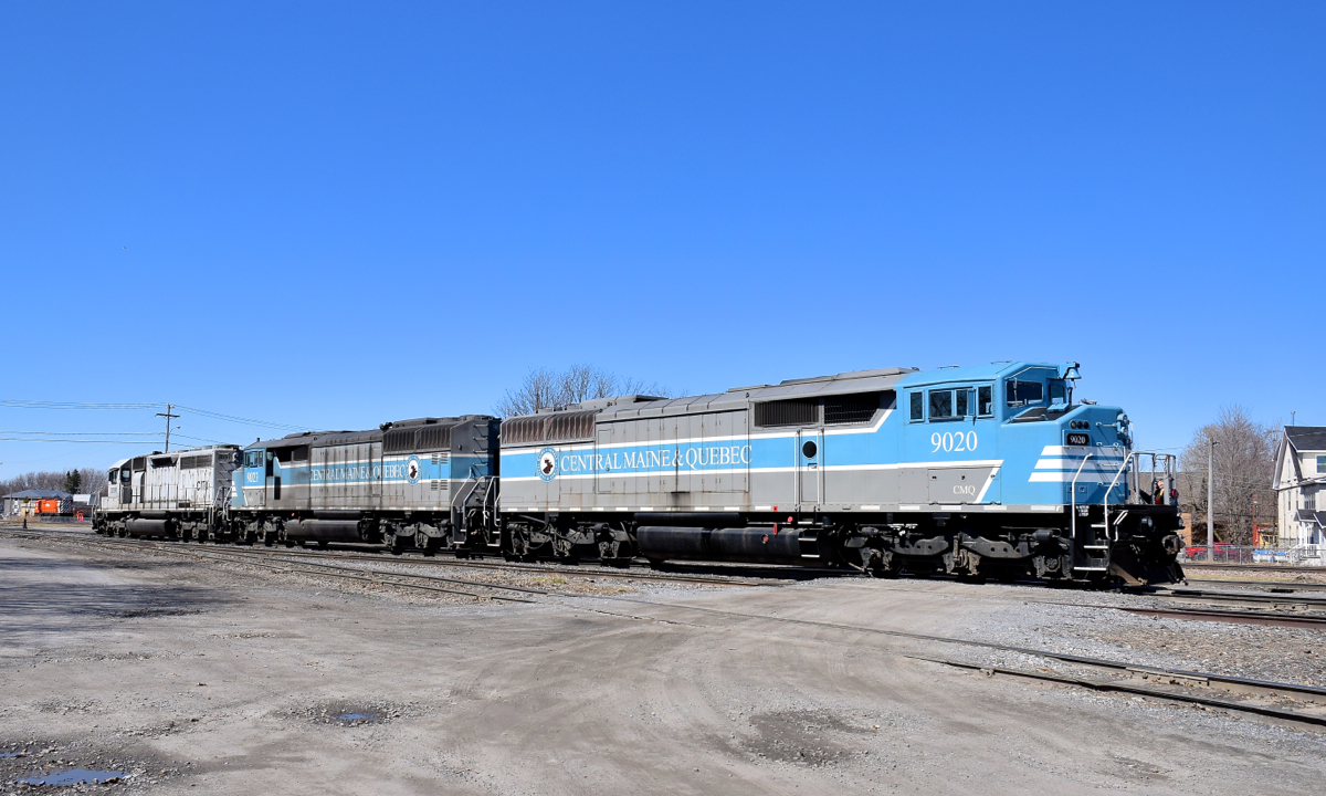 A pair of ex-CP Red Barns (CMQ 9020 & CMQ 9023, same numbers on CP) are teamed with CITX 3091 (originally SD40 CP 5552) as they take apart CMQ 1 in the Farnham Yard. Here the power heads back towards the yard, with the conductor on the nose of CMQ 9020. In the far distance at left is M636 CP 4723, slated to be scrapped in the near future.