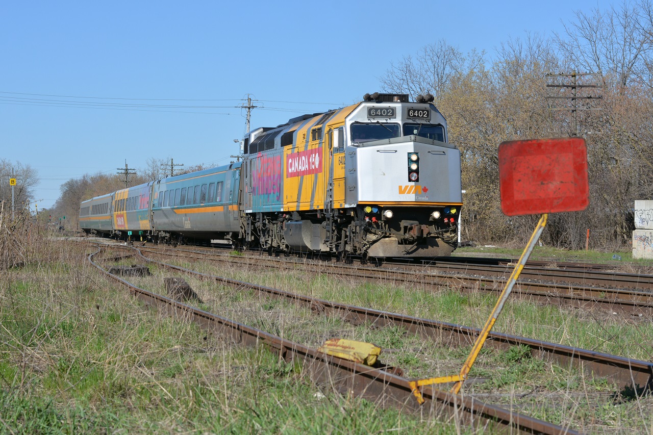 VIA Rail and a derail... The second of three F40 Canada 150 wraps heads through Guelph Jct.