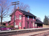 Cavan station in its later years. It still has the train board and the Dayliner still offered passenger service. It was demolished a couple of years later. The siding was usually used for car storage. Photo and scan by my Brother.