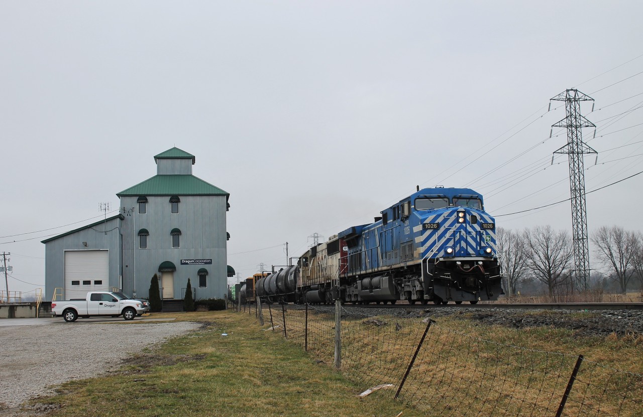 CP 235 flies past the old silo in the hamlet of Elmstead which is part of Lakeshore, Ontario. SOO 6027 is one of 3 SOO SD60(M) units still out on the road, along with 6053 and 6061.