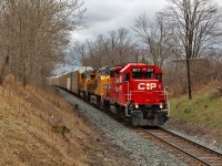 I faintly heard through the static on the scanner about the Puslinch Mile Board so off I went to see what was up. Around the bend comes CP 244 led by GP38AC, CP 3017 looking all shiny and new, with a pair of Union Pacific locomotives for added power in UP 7986 and UP 3997 with 6800 feet of auto racks in tow.