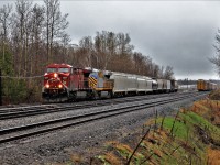 The daily CP 147 has been starting to look a lot like the past. You never know what power may be on it. Today was no exception.  CREX 1401, (Citirail), is tucked in behind CP 8571 as they pull their new load out of the OSR side tracks at Guelph Junction to be rejoined to its load of auto racks sitting on the North track. And yes, its raining and miserable when the good trains come out.