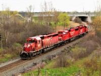 We have quite the trio of power here with CP 6017 (SD40-2) with CP 6258 (SD60M) and CP 2278 (GP20C-Eco) hauling the management train Southbound on the Hamilton sub about to go under the Newman Street overpass. The trio would pick up full ballast cars and used rail tie gondolas and head North with CP 2278 on point.
