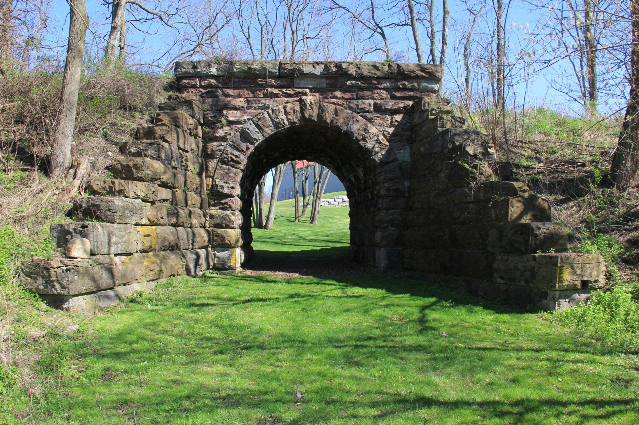 Stone Arch Tunnel, dated 1877. Located on the former Great Western Railway mainline, between St. George and Paris Junction. This was built to allow the farmer, who owned the land, access to his fields to the south.

This line was built in 1853, the line was closed by Canadian National in 1932 and the rails lifted, from Paris to St. George in 1938.

Taken on private property with the owner's permission.