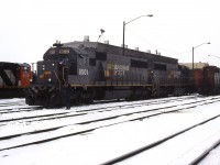 A Doug Lawson photo.
In early January 1984, CN borrowed a pair of 1-year old Seaboard SD50's to test the latest offerings from EMD. It was a mutual deal, as CN provided SBD with a near-equivalent in horsepower by loaning the U.S. road 3 SD40's - 5124, 5127 and 5130. The test period was 30 days and basically took place between Vancouver and Edmonton. Here an outgoing crew is about to take charge of the LaGrange products coming off the shop track, while other London-built units await their turn.