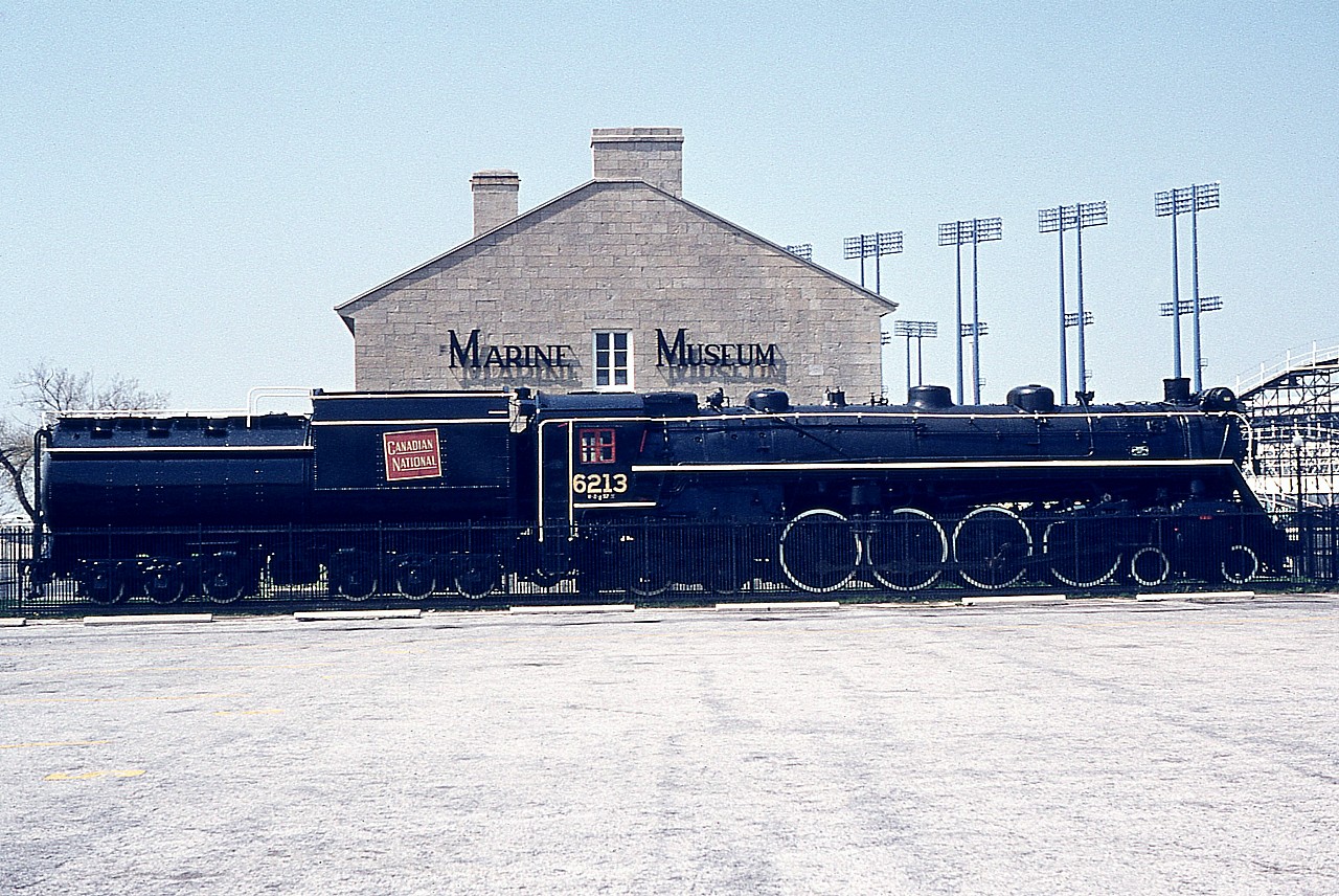 It is coming up to 8 years (06/10/09) since the preserved CN "Northern" 4-8-4 #6213 has graced the Canadian National Exhibition grounds. The locomotive, which racked up more than a million miles in its' day, was donated to the City of Toronto back in 1960, and has spent most of its' retirement on display at the Stanley Barracks in the CNE grounds. As noted in the photo, this was the home of the Marine Museum (of Upper Canada). The Museum was moved out of the Barracks location in 2000, and eventually the steam engine was relocated to the Toronto Railway Heritage Centre, located at the old CPR John St Roundhouse, where it remains today.