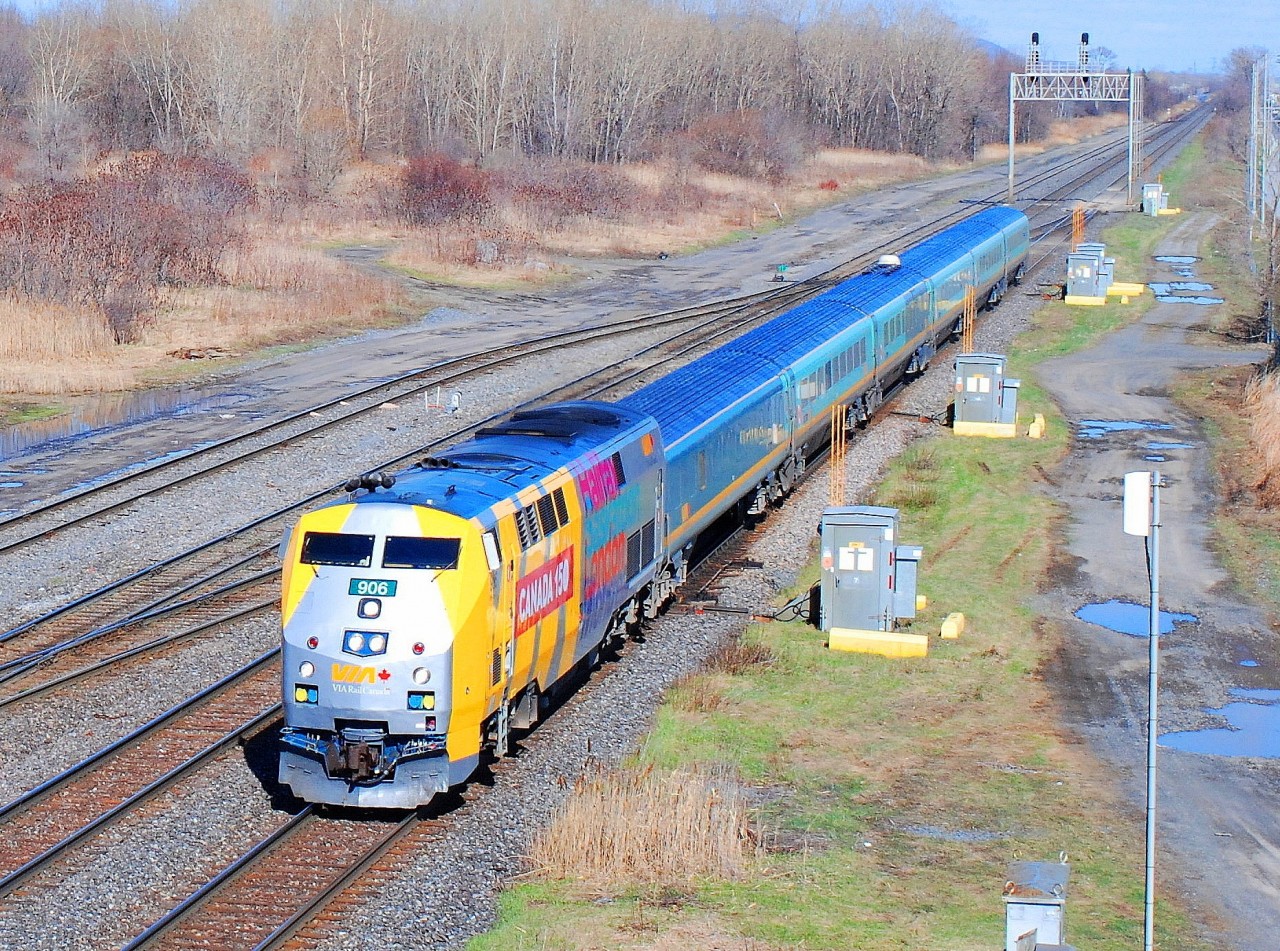 Via 906 EPA-42-A colours of Canada 150 coming from Québec going to Montréal  Ottawa Fallowfield  via route 37 on south main track