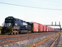 Norfolk Southern Buffalo-St. Thomas train 327 with a single Dash 9-40C is doing his best to maintain track speed with a large contingent of hi-cubes at CN Paris Jct. Train 327 had settled into a fairly reliable timeframe during 2004, 2005, making it easy to catch whatever motive power NS could scrounge up for it's valuable Ford Talbotville run. And unless something out of the ordinary happened, the same power would be bringing 328 back the following morning. So just like the CERTS breath mint commercial, it would be "two..two.. two [chances] in one' to catch the power.