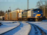 I've been appreciating some of the F unit photos posted here recently. For example, Lance's photos of CN F units out west - and Bruce's VIA F's in the Chatham area - and Doug's shots of Wabash/N&W/NYC/PC F's -  so let's continue the F unit parade. Anyone care to join in? <br><br>2015 was peak foam on the Ontario Southland Railway - Plow extras ran frequently in Winter, 6508 was painted by summer, and the F's were put together on a few occasions to the delight of cameras. When I heard that all three covered wagons were together, I quickly burned a vacation day to spend it in the Woodstock area. Peak OSR foam in 2015? Dare I say I expect OSR to outdo themselves in the not too distant future? The Salford Surprises just keep on coming so plan your visit soon. For now, let's reminisce to what was now more than two years ago as OSR switched Woodstock yard before departing west for CAMI. In the foreground is the CPR Galt sub, and the MOW shed (which once housed speeders) at left.